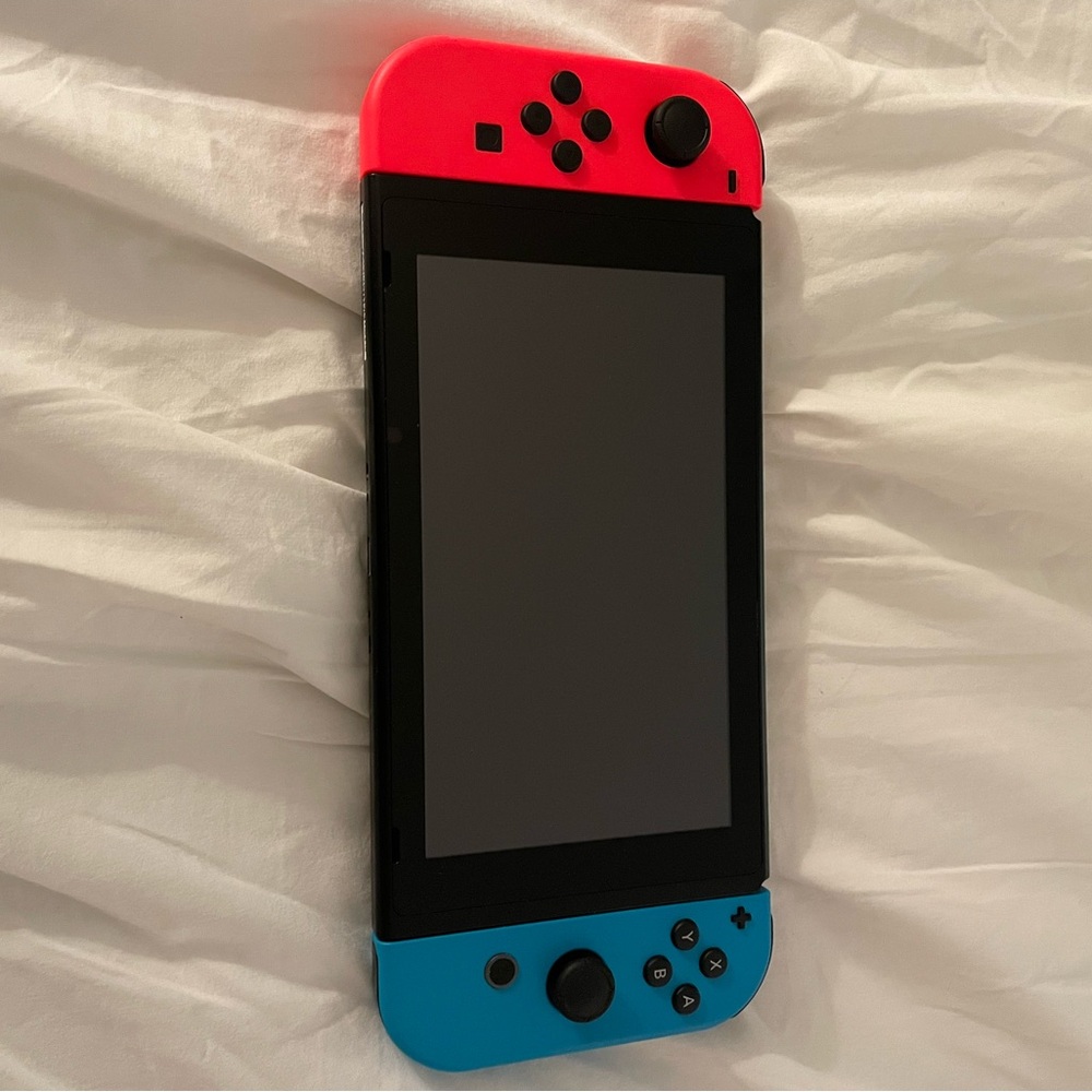 Nintendo Switch Console with Bright Red and Blue Joy-Cons (Great Condition)